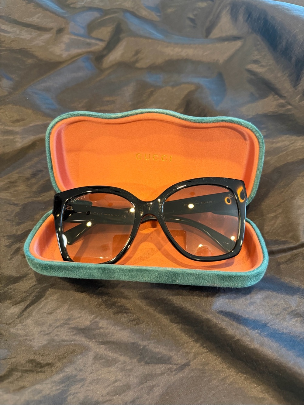 Gucci Black Frame Sunglasses with Brown Gradient Lenses